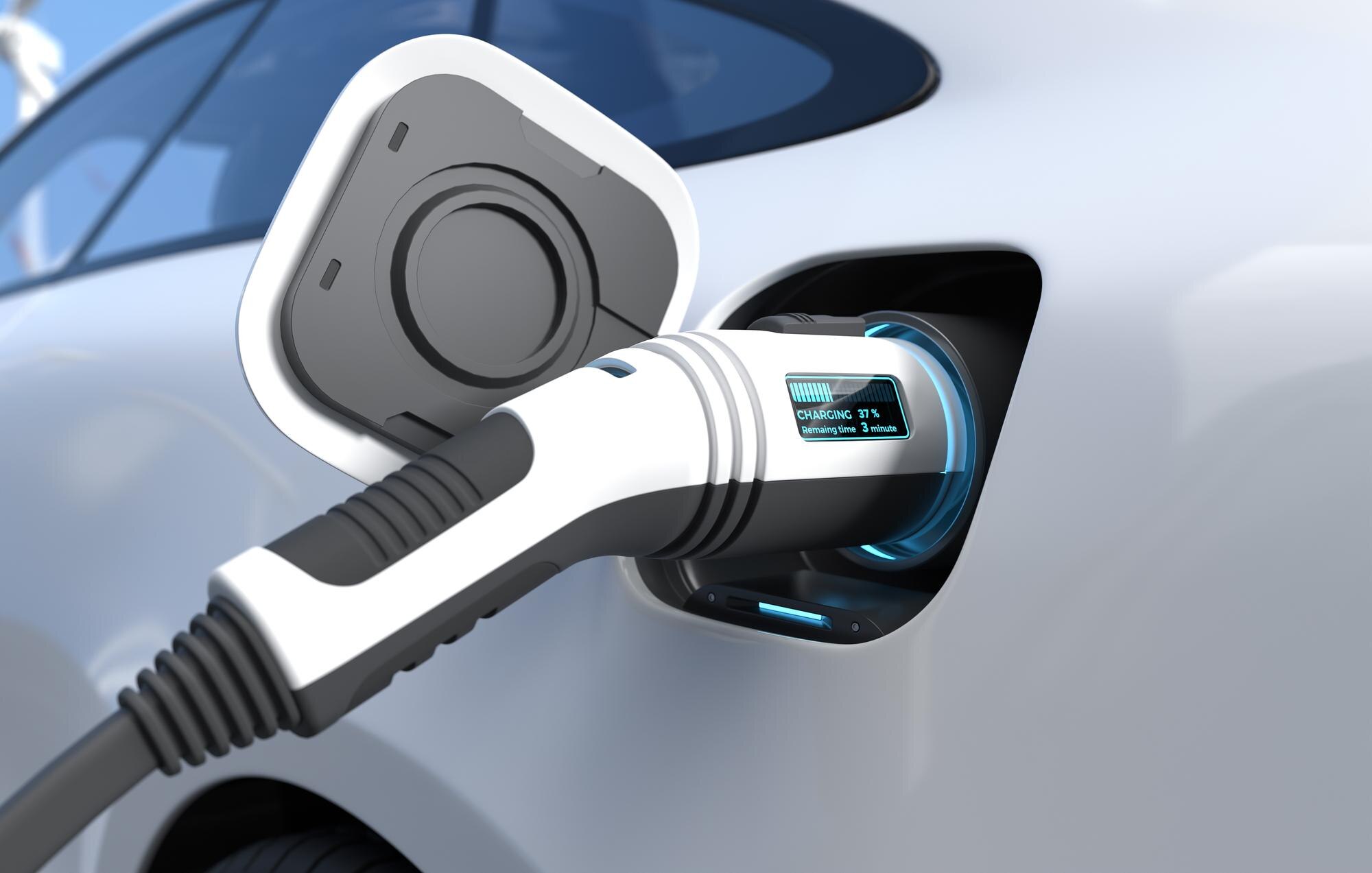Sähköauto latauksessa kotilatauslaitteella.
